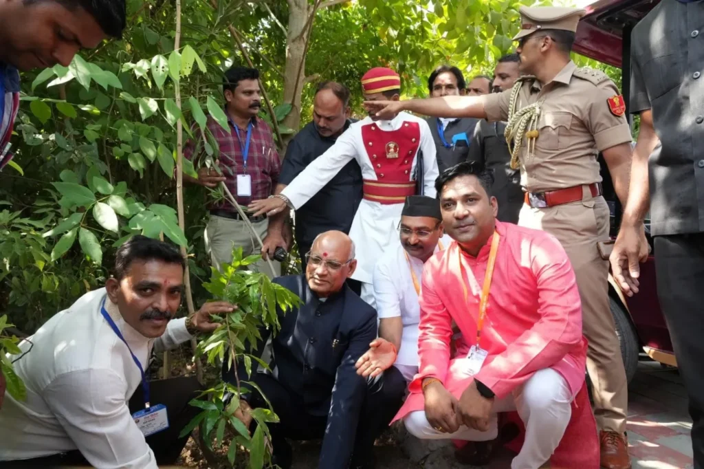 Umesh Gupta, our client planting a sapling with the volunteers